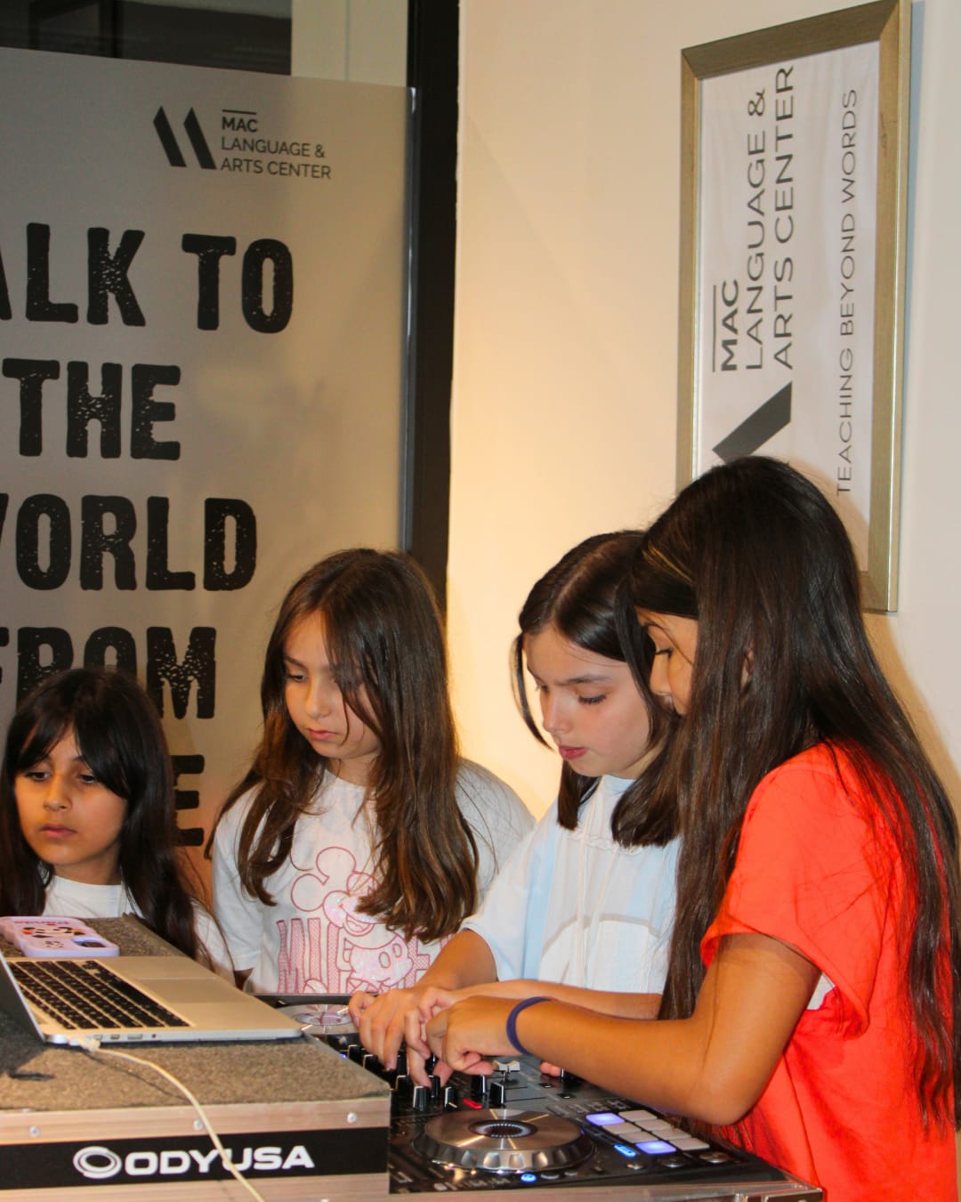 Students at a Mac Language & Arts community event