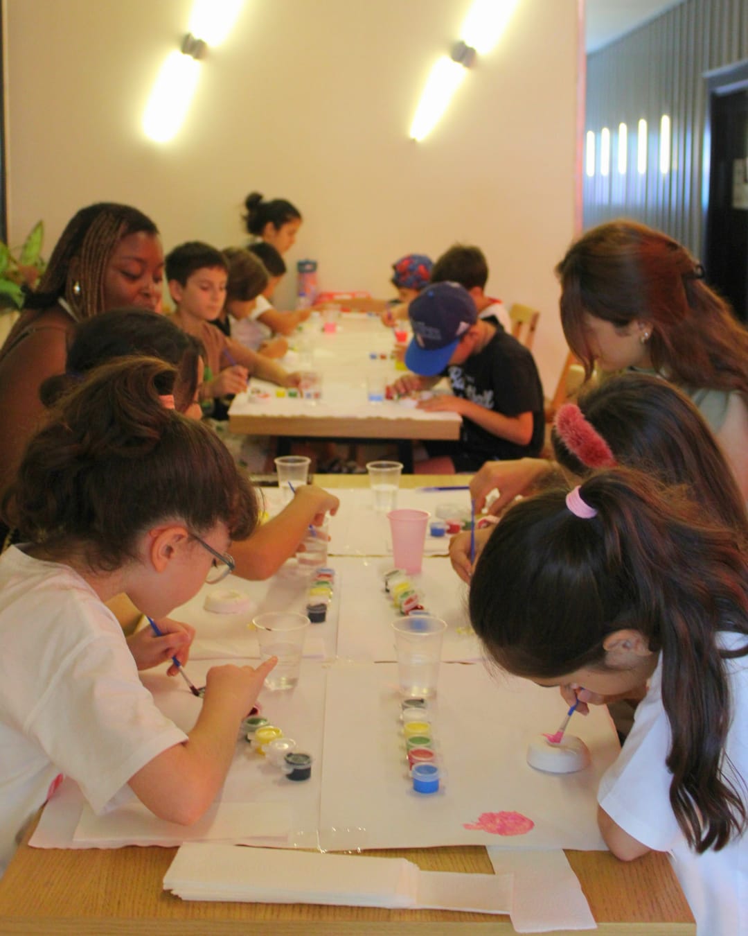 Kids in a creative English workshop